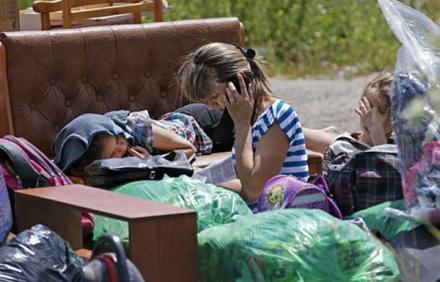 Дороги беженцев из Донбасса: гостеприимная Польша и суровая Россия