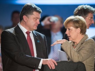 Меркель после переговоров с Порошенко выступила с обращением к Путину