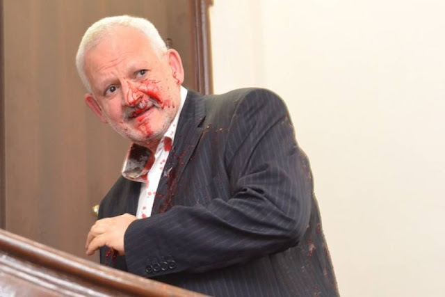 Нардеп від «Опоблоку» не встав під час вшанування жертв Голодомору