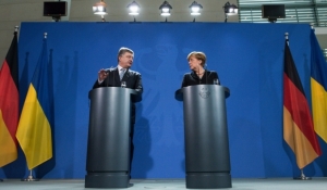 Як Меркель бігла за Порошенком