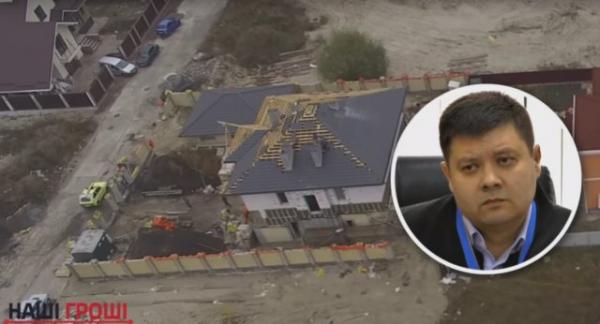 Судья "припрятал" элитный дом под Киевом, квартиру и паркоместо