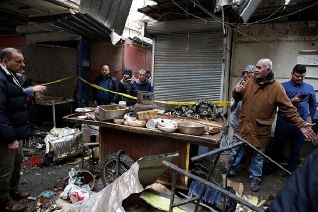 Серия взрывов в Багдаде: страшные последствия теракта собрали в фоторепортаже