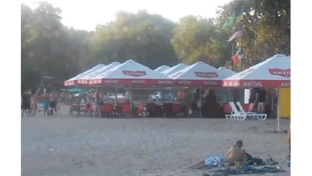 Появилось видео драки и кровавой перестрелки на пляже в Полтаве