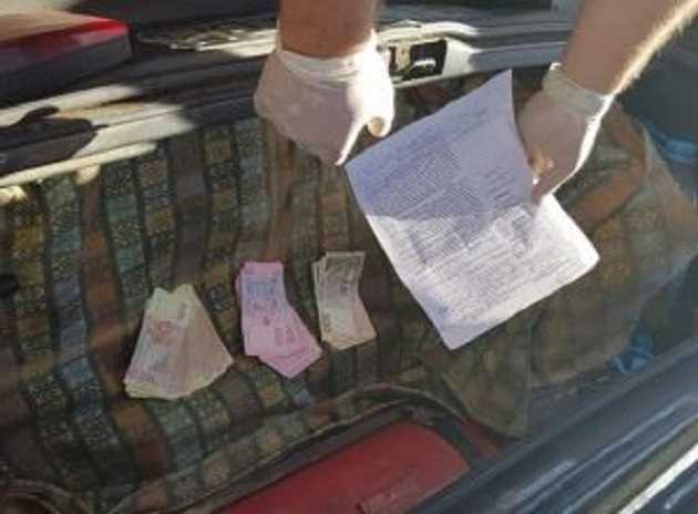 Офіцерів поліції підозрюють у вимаганні тисячі доларів хабаря