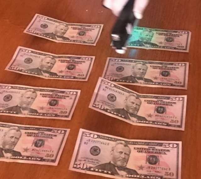 Як в Україні дають хабарі фальшивками та купують на них топові айфони