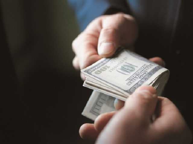 На взятке попался чиновник управления Госгеокадастра в Киевской области