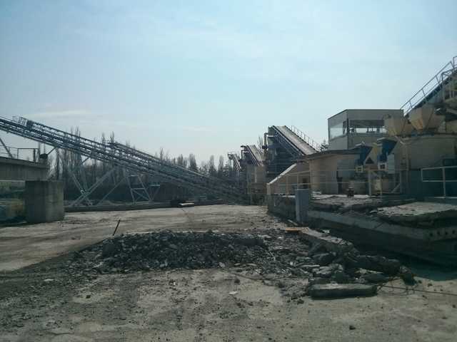 В Кременчуге госрегистратор и чиновники Минюста помогли рейдерам захватить карьер