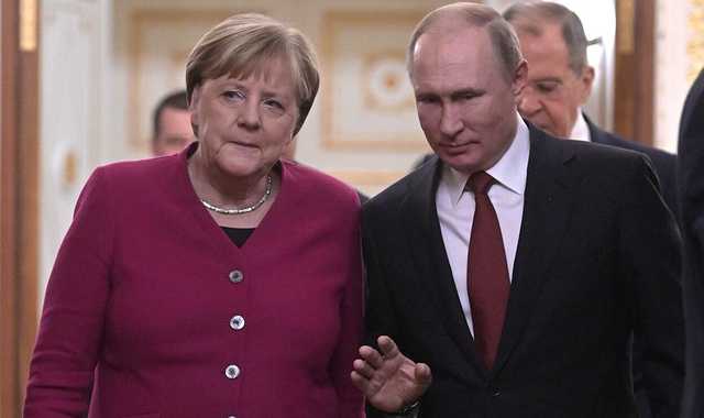 Поздравления от Путина через гонца Меркель — эксперт