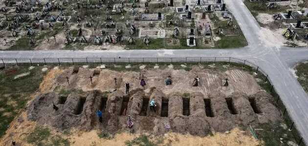 В Буче ежедневно хоронят украинцев, погибших во время российской оккупации