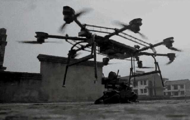 Китай показал, как взаимодействуют его военные дроны и роботы