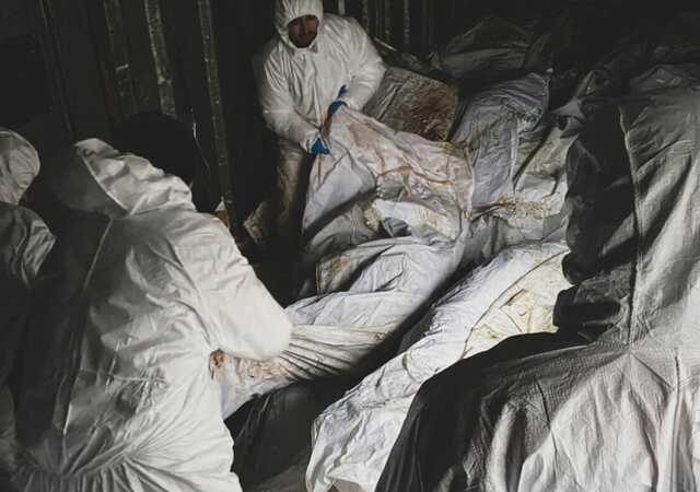 На Харьковщине собирают тела ликвидированных российских оккупантов: часть из них заминированы