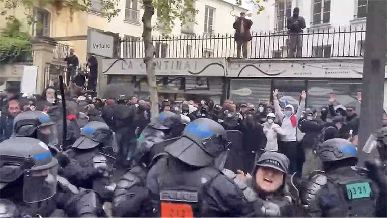 У Франції першотравневі протести: горять будівлі, поліцейського мало не спалили "коктейлем Молотова"