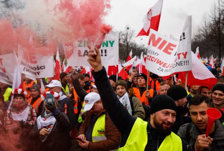 In Warsaw, police dispersed striking farmers with tear gas