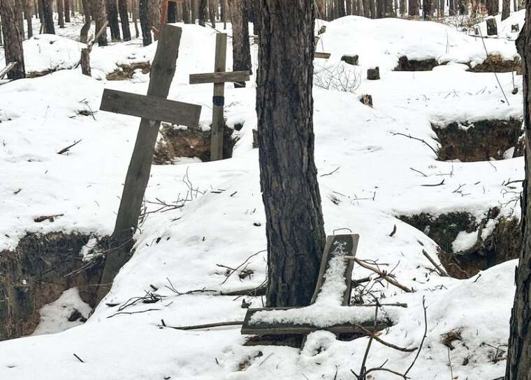 Розслідування масового поховання в Ізюмі: ідентифіковано 402 загиблих