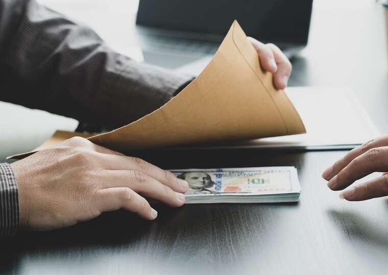 A cardiologist from TRC is suspected of demanding 500 dollars for a "necessary" diagnosis