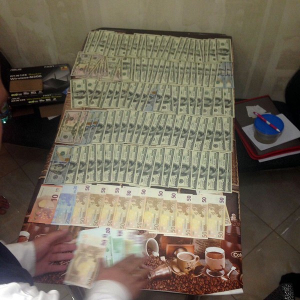 пов’язали на хабарі вінницьких чиновників фото