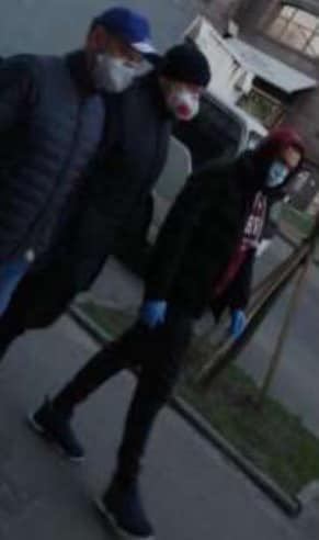 The image may contain: one or more people, people standing and shoes