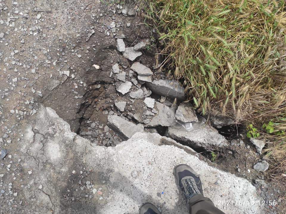 у Миколаєві провалилася дорога після зливи у Миколаєві провалилася дорога після зливи