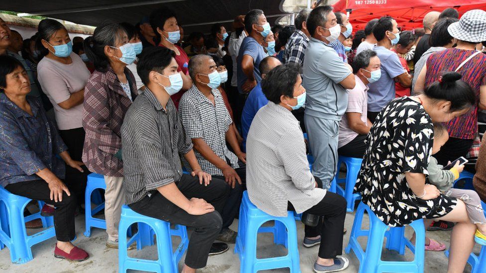 rural residents wait of vaccine in Anhui dqxikeidqxiqqeant