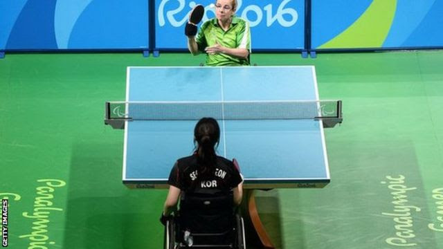 Rena McCarron Rooney of Ireland serves during the quarter-finals against Su-Yeon Seo of South Korea in table tennis at the Rio Paralympic Games