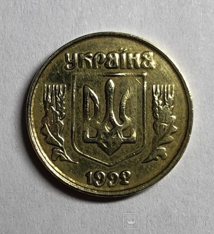 В обозначении года выпуска на реверсе цифра "2" отлита с дефектом