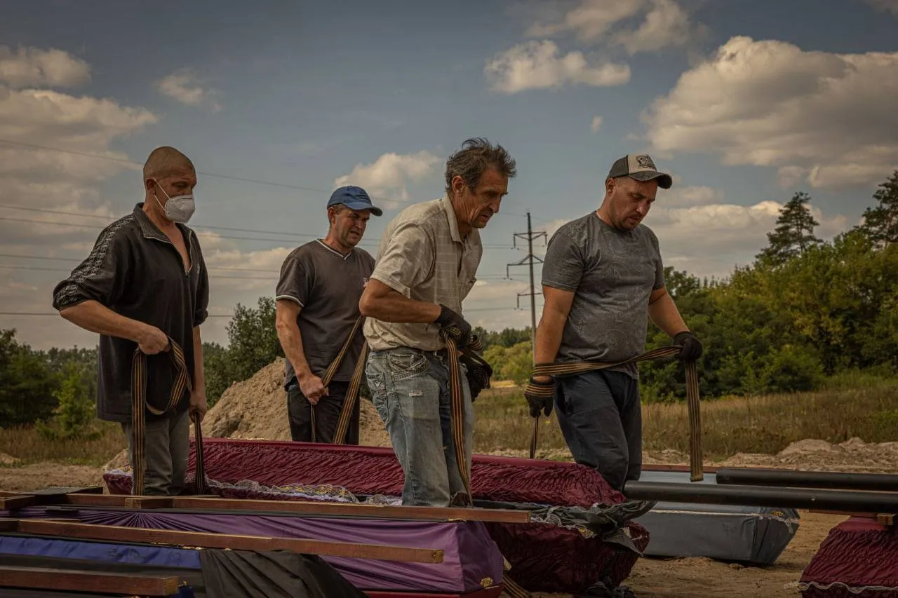 Буча, поховання 15 загиблих dqxikeidqxiqqeant