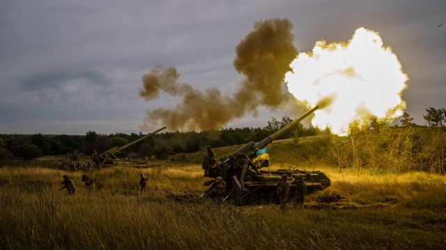 A Russian self-propelled gun fires a round