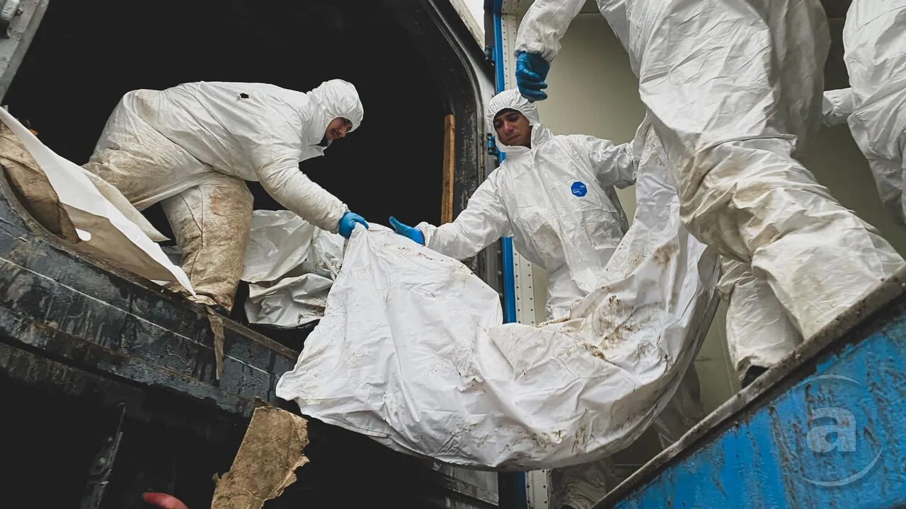 На Харківщині збирають тіла ліквідованих російських окупантів: частину з них заміновано. Фото