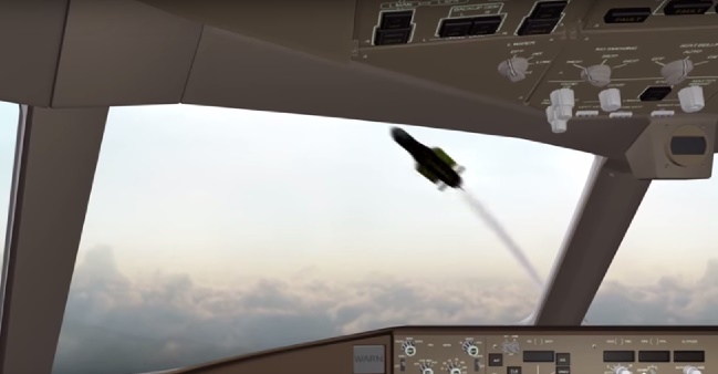 An armed pro-Russian separatist stands on part of the wreckage of the Malaysia Airlines Boeing 777 plane after it crashed near the settlement of Grabovo in the Donetsk region, July 17, 2014. The Malaysian airliner flight MH17 was brought down over eastern Ukraine on Thursday, killing all 295 people aboard and sharply raising stakes in a conflict between Kiev and pro-Moscow rebels in which Russia and the West back opposing sides. REUTERS/Maxim Zmeyev (UKRAINE - Tags: TRANSPORT DISASTER POLITICS CIVIL UNREST TPX IMAGES OF THE DAY) - RTR3Z3JK