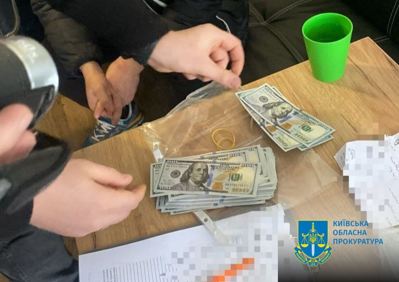 Обкладали даниною місцевих підприємців: на Київщині затримали банду вимагачів. Фото