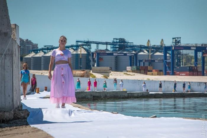 A person in a pink skirt

Description automatically generated