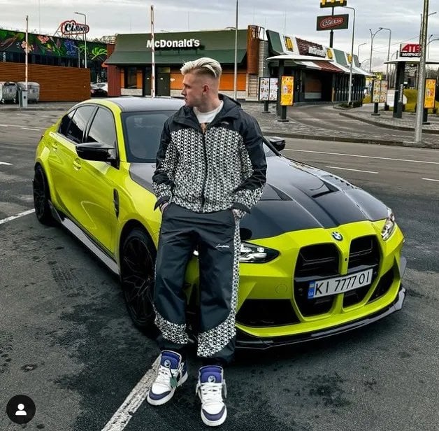 Alexander Slobozhenko and a BMW M3 car registered to his mother (Photo: Slobozhenko’s social networks)