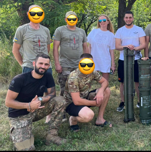 Alexander Kulik with soldiers and volunteers