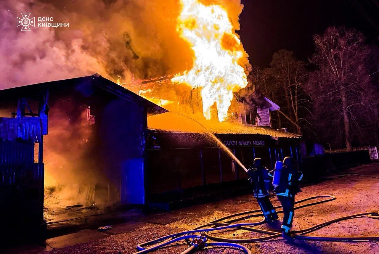 As a result of the enemy attack in Kyiv region, a furniture store caught fire, and houses were damaged. Photo
